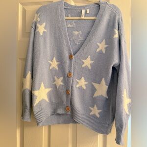 Star sweater, size small.